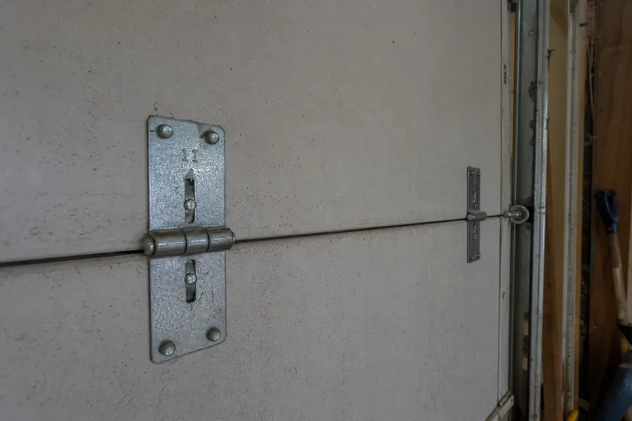 The wall control on a garage door opener in Irving, TX